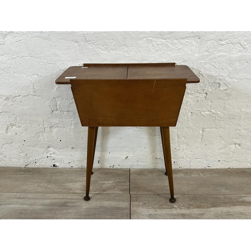 47 - A mid 20th century teak and plywood sewing box on beech splayed supports - approx. 57cm high x 26cm ... 