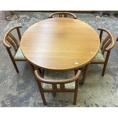 50 - A mid 20th century Danish Skovmand & Andersen teak circular dining table and four chairs - approx. 7... 