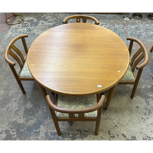 50 - A mid 20th century Danish Skovmand & Andersen teak circular dining table and four chairs - approx. 7... 