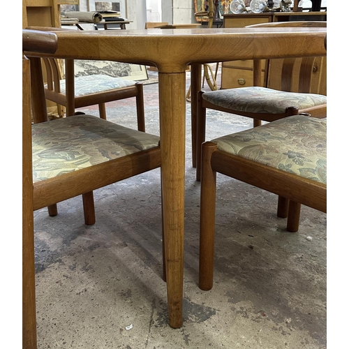 50 - A mid 20th century Danish Skovmand & Andersen teak circular dining table and four chairs - approx. 7... 