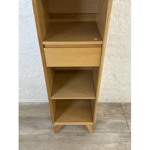 51 - A John Lewis oak effect four tier bookcase - approx. 184cm high x 40cm wide x 40cm deep