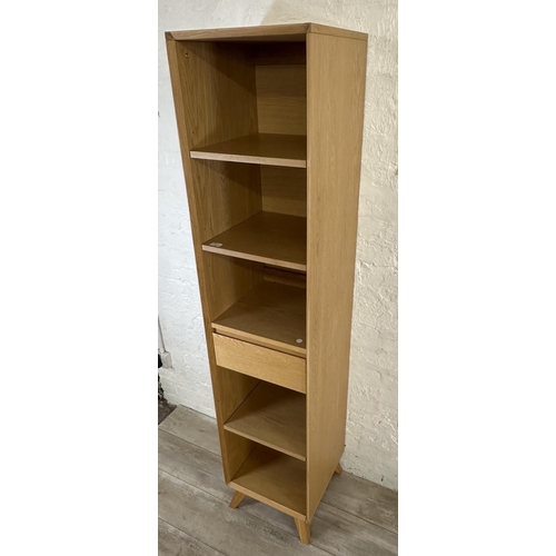 51 - A John Lewis oak effect four tier bookcase - approx. 184cm high x 40cm wide x 40cm deep