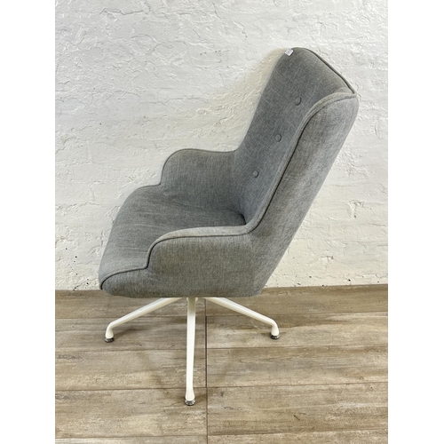 56 - A contemporary The Range grey fabric Aranae spider leg swivel chair