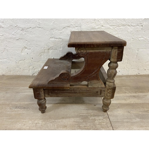 59 - A Regency style carved hardwood two tread library step - approx. 39cm high x 42cm wide x 42cm deep