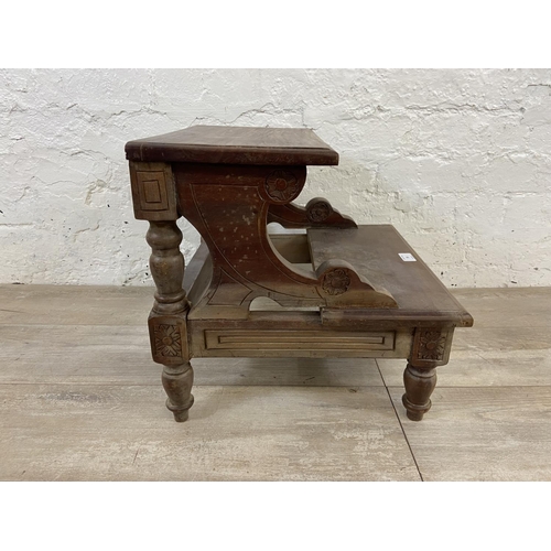 59 - A Regency style carved hardwood two tread library step - approx. 39cm high x 42cm wide x 42cm deep