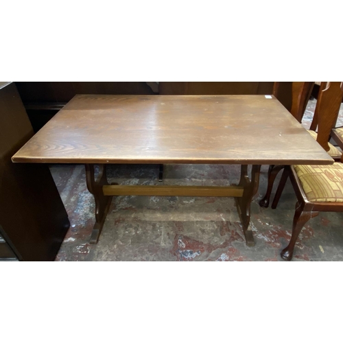 60 - Four pieces of furniture, one oak twin pedestal dining table, one mahogany rectangular storage side ... 