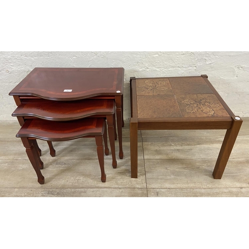 61 - Two pieces of furniture, one mid 20th century teak ceramic tile top side table and one mahogany nest... 