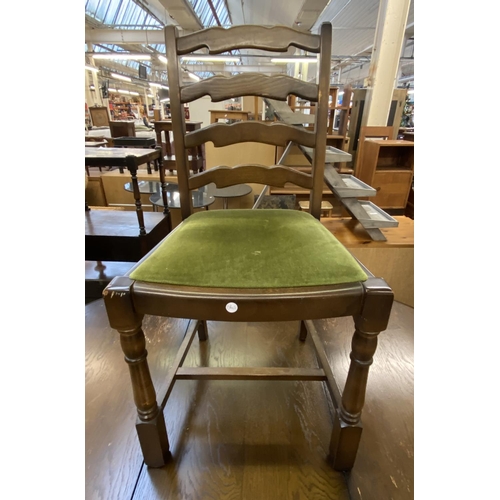 65 - A Priory oak dining table and four green fabric upholstered chairs - approx. 78cm high x 122cm wide ... 