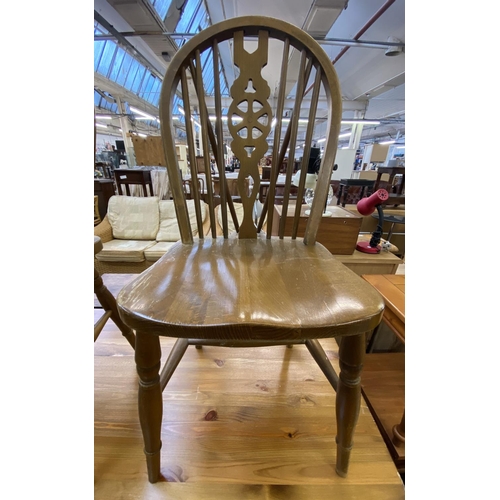 70 - A Victorian style pine farmhouse dining table and four beech wheel back dining chairs - table approx... 