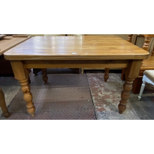 70 - A Victorian style pine farmhouse dining table and four beech wheel back dining chairs - table approx... 