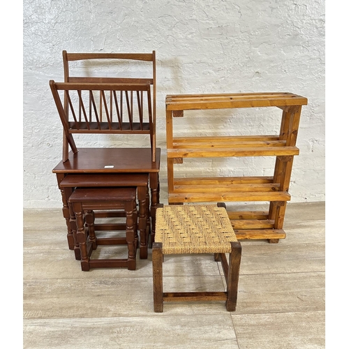 79 - Four pieces of furniture, one teak magazine rack, one pine shoe rack, one hardwood nest of tables an... 