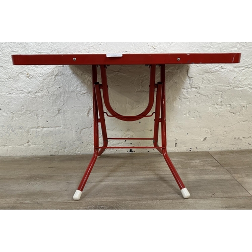 8 - A mid 20th century N.K. red plastic and tubular metal folding Thai alphabet child's table - approx. ... 