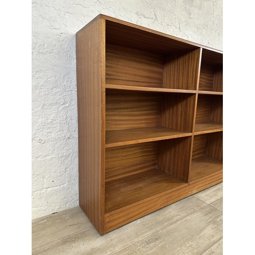 82 - A mid 20th century teak bookcase - approx. 94cm high x 122cm wide x 28cm deep