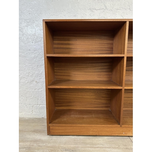 82 - A mid 20th century teak bookcase - approx. 94cm high x 122cm wide x 28cm deep