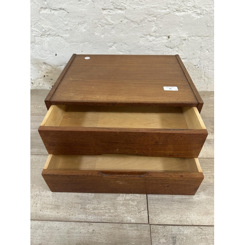 84 - Five items, one mid 20th century teak two drawer index filing cabinet, three desk lamps and one larg... 