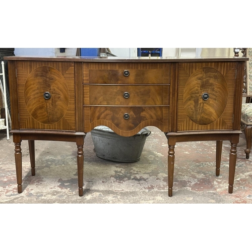 95 - A Regency style inlaid mahogany serpentine sideboard - approx. 87cm high x 145cm wide x 50cm deep