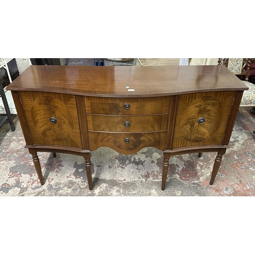 95 - A Regency style inlaid mahogany serpentine sideboard - approx. 87cm high x 145cm wide x 50cm deep