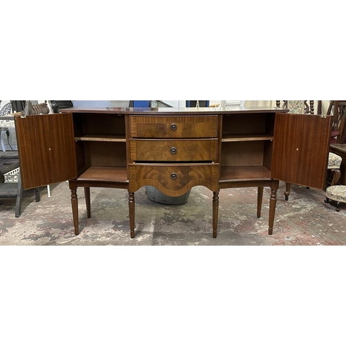 95 - A Regency style inlaid mahogany serpentine sideboard - approx. 87cm high x 145cm wide x 50cm deep