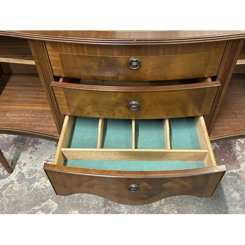 95 - A Regency style inlaid mahogany serpentine sideboard - approx. 87cm high x 145cm wide x 50cm deep