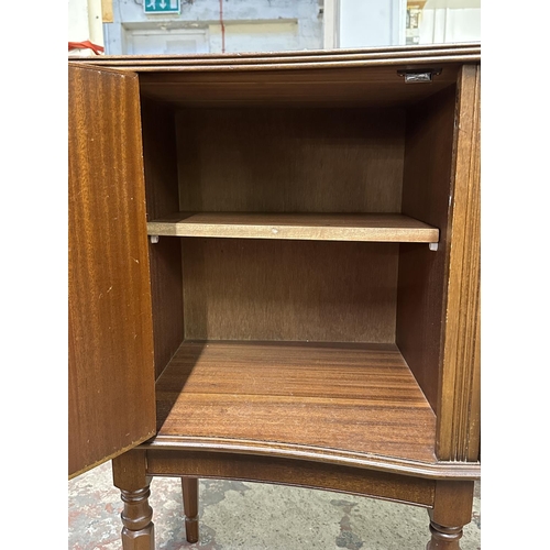 95 - A Regency style inlaid mahogany serpentine sideboard - approx. 87cm high x 145cm wide x 50cm deep