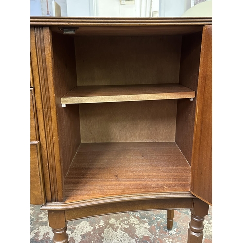 95 - A Regency style inlaid mahogany serpentine sideboard - approx. 87cm high x 145cm wide x 50cm deep