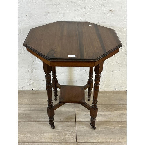 98 - An Edwardian mahogany octagonal two tier side table