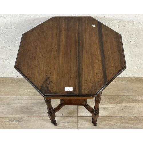 98 - An Edwardian mahogany octagonal two tier side table