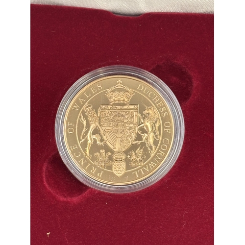 2297 - A boxed Royal Mint 22ct gold proof Celebration Medal to Commemorate the Marriage of HRH The Prince o... 