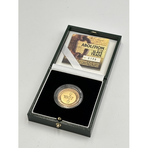 2298 - A boxed Royal Mint Abolition of the Slave Trade UK £2 22ct gold proof coin with certificate of authe... 