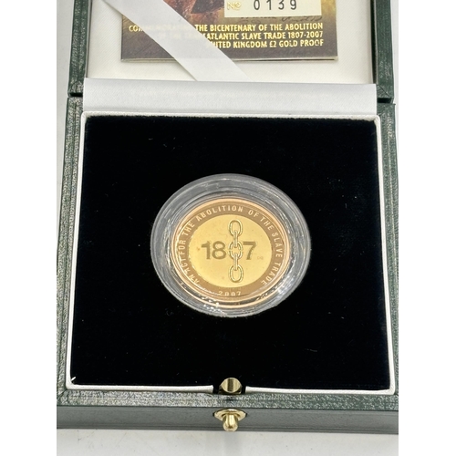 2298 - A boxed Royal Mint Abolition of the Slave Trade UK £2 22ct gold proof coin with certificate of authe... 