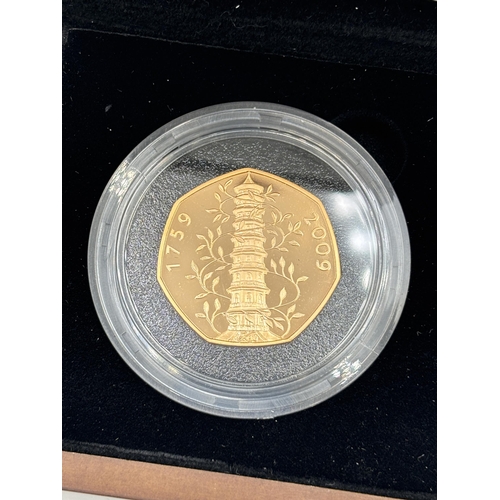 2301 - A boxed The Royal Mint The 2009 UK Kew Gardens 50p 22ct gold proof coin with certificate of authenti... 