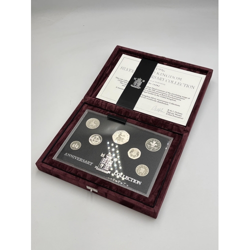 2302 - A boxed Royal Mint 1996 United Kingdom Silver Anniversary .925 silver coin collection with certifica... 