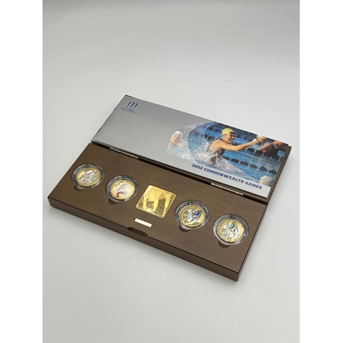 2303 - A boxed Royal Mint 2002 Commonwealth Games fine gold plated .925 silver proof Piedfort coin collecti... 