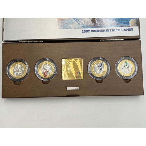 2303 - A boxed Royal Mint 2002 Commonwealth Games fine gold plated .925 silver proof Piedfort coin collecti... 