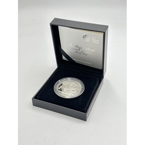 2305 - A boxed The Royal Mint The Royal Birth 2013 UK £5 silver proof coin with certificate of authenticity