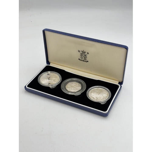 2312 - A boxed 1991-1995 World War II 50th Anniversary three coin silver proof set comprising The Royal Min... 