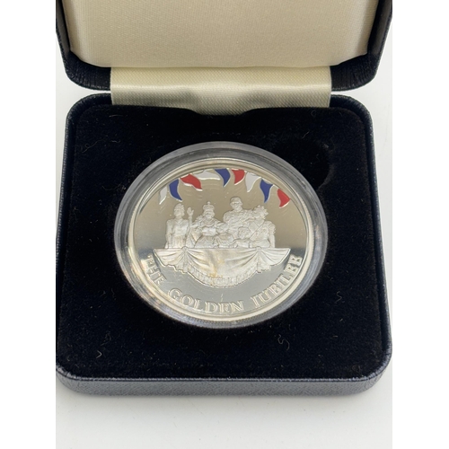 2314 - A boxed Valcambi Switzerland 2002 Falkland Islands Golden Jubilee proof 50p coin with certificate of... 