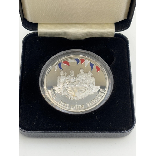 2314 - A boxed Valcambi Switzerland 2002 Falkland Islands Golden Jubilee proof 50p coin with certificate of... 