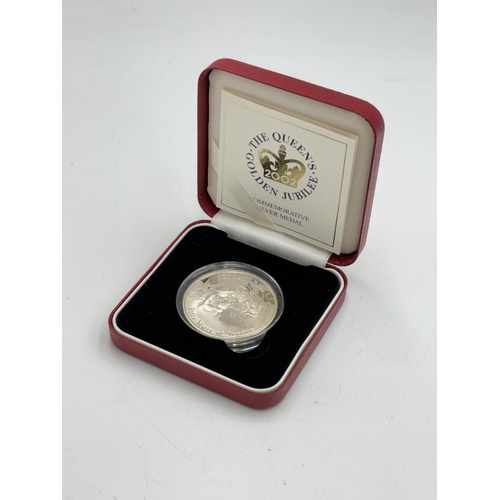 2315 - A boxed The Royal Mint 2002 Golden Jubilee .925 silver proof medal with certificate of authenticity ... 