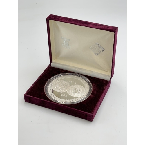 2322 - A boxed The Royal Mint 500th Anniversary of the Gold Sovereign .999 silver proof souvenir medal with... 