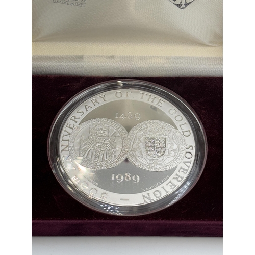 2322 - A boxed The Royal Mint 500th Anniversary of the Gold Sovereign .999 silver proof souvenir medal with... 