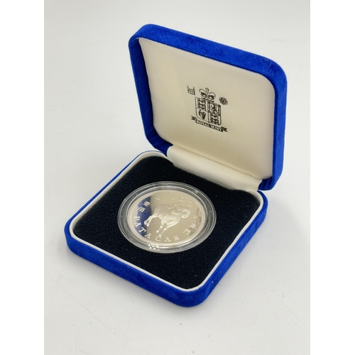 2333 - A boxed Royal Mint 1991 Macau Chinese New Year 'Year of the Goat' 100 Patacas .925 silver proof coin