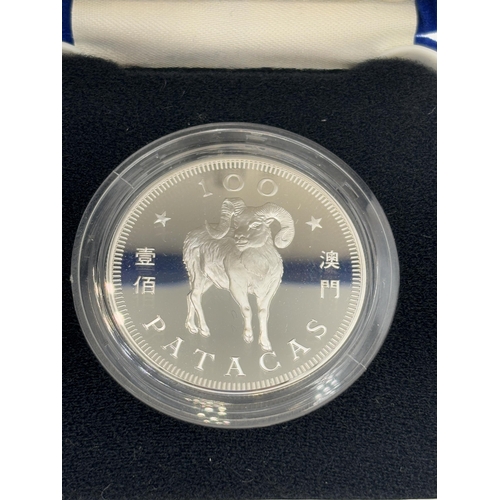 2333 - A boxed Royal Mint 1991 Macau Chinese New Year 'Year of the Goat' 100 Patacas .925 silver proof coin