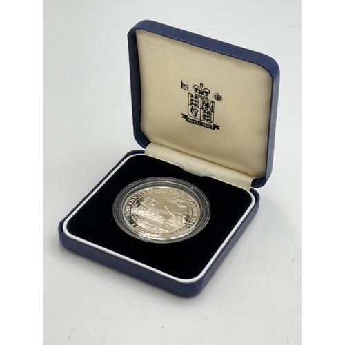 2338 - A boxed Royal Mint 1991 Solomon Islands 50th Anniversary Pearl Harbor 1941-1991 $1 .925 silver proof... 