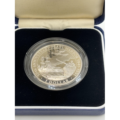 2338 - A boxed Royal Mint 1991 Solomon Islands 50th Anniversary Pearl Harbor 1941-1991 $1 .925 silver proof... 