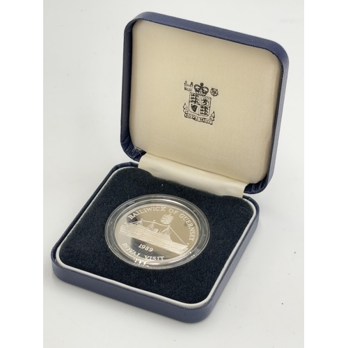 2347 - A boxed Royal Mint 1989 Guernsey 'Royal Visit' .925 silver proof £2 commemorative coin with certific... 