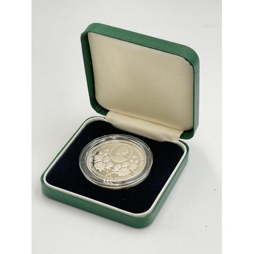 2351 - A boxed British Royal Mint 'Alderney' The Queen Mother 90th Birthday £2 .925 silver Piedfort proof c... 