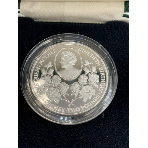 2351 - A boxed British Royal Mint 'Alderney' The Queen Mother 90th Birthday £2 .925 silver Piedfort proof c... 