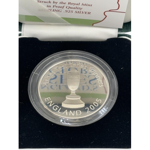 2351A - A boxed Royal Mint England's Ashes Victory .925 silver commemorative proof medal with certificate of... 