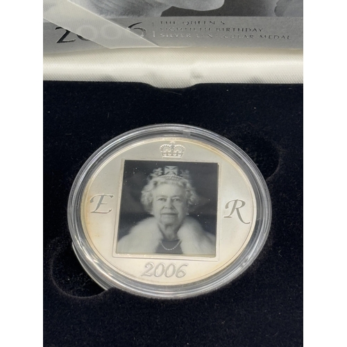 2355 - A boxed Royal Mint 2006 The Queen's Eightieth Birthday silver Lenticular Medal with Certificate of A... 